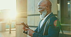 Phone, black man and happy ceo in city, lens flare and typing at sunset outdoor. Mobile, mature and African business consultant smile in street reading, social media meme and funny laugh for comedy