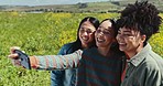 Women friends, selfie and outdoor on field for summer adventure, flowers and nature in countryside. Girl group, park and photography with canola, social media or bush with freedom, sunshine or spring