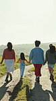 Family, field and happy with back, freedom and energy in countryside, hand holding and carefree. Women, girl and outdoor in nature, adventure and holiday for sustainability, travel and vacation