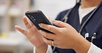 Woman, phone and nurse typing for social media, communication or research at pharmacy or hospital. Closeup of female person, medical or healthcare doctor on mobile smartphone app for networking