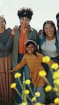 Family, travel and child in field with flowers smile for adventure, happiness and freedom outdoors. Happy siblings, excited and portrait of people with girl on holiday, vacation and weekend in nature