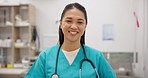 Face, nurse and smile for healthcare, career and medical service in hospital or clinic with uniform. Medicine, doctor or professional employee with pride for cardiology, portrait or health insurance