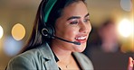 Call center, woman and happy communication at night in office for customer service, CRM advisory and consulting. Face, indian agent and questions for telecom support, contact and telemarketing advice