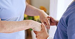Hands, medical and support of a caregiver with a patient in an assisted living home for support. Trust, healthcare and empathy with a nurse helping a senior person in a clinic closeup as a volunteer