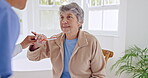 Old woman, brushing teeth or nurse helping in nursing home, retirement clinic for wellness or support. Explaining, talking or elderly patient cleaning mouth with caregiver for dental or oral health