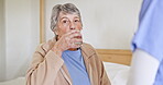 Senior woman, pills and retirement home for health, help and nurse for elderly, medicine and sickness. Healthcare, wellness or care for illness, treatment or drugs in bedroom, vitamins or supplements