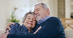 Happy, senior couple and hug in home for love, care and together for romance, retirement or marriage. Elderly man embrace woman for loyalty, commitment and relax for trust, comfort or support partner