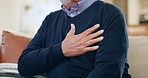 Hand, chest of senior person and heart attack, anxiety or pain with disease and hypertension closeup. Cardiac fail, medical condition and angina, old age with emergency and cardiovascular healthcare