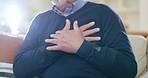 Hands, chest of senior person and heart attack, anxiety or pain with disease and hypertension closeup. Cardiac fail, medical condition and angina, old age with emergency and cardiovascular healthcare