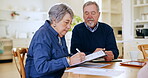 Home, senior couple and documents with savings, retirement and meeting with investment, pension fund and conversation. Worker, elderly man or old woman with paperwork, finance or mortgage in a lounge