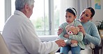 Doctor, mother and girl with writing in consultation, talking and notes for assessment, review and advice. Senior pediatrician, mom and sick daughter for conversation, notebook and medical history