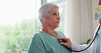 Patient, doctor and breathe with stethoscope for healthcare exam, office and lung test for wellness. Mature woman, specialist or cardiologist listen to patient heart in clinic, consultation and help