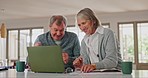 Laptop, smile and senior couple networking on social media, website or the internet together. Happy, smile and elderly man and woman in retirement watching funny video on computer for bonding at home