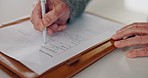 Document, hands and senior person signing a contract, loan or will on clipboard at a modern home. Paper, pen and closeup of elderly woman in retirement with signature for approval of a deal at house.