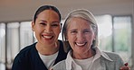 Senior woman, face and caregiver with a smile from homecare and retirement home with medical support. Rehabilitation, healthcare and nursing professional happy from wellness and health in a house 