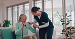 Woman, doctor and walking in elderly care for support, healthcare or nursing at old age home. Female person, nurse or medical caregiver helping senior patient on living room sofa with kane at house