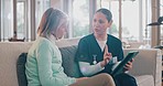 Senior care, old woman and caregiver on sofa with tablet for advice, results and conversation together in home. Digital app, consulting and elderly person on couch with nurse, talk and healthcare.