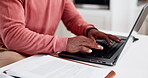 Hands, typing on laptop and documents for home budget, financial planning and asset management research. Freelance worker or person on computer with paperwork, taxes and registration or information