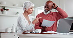 Elderly, couple and stress for finance with paperwork or discussion for life insurance, mortgage loan or retirement investment in kitchen. Accounting, people and anger for budget or asset management