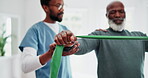 Physiotherapy, hand and resistance with a black man in a clinic for rehabilitation or recovery from injury. Consulting, healthcare or medical with a physiotherapist and client for strength training