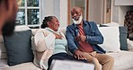 Senior couple, happy and in therapy with a psychologist for communication help and a consultation. Laughing, support and an African elderly man and woman speaking in counseling with a therapist