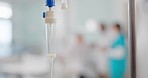 IV drip, liquid and medicine in a hospital for healthcare, virus or help in an emergency. Health, clinic and a fluid, solution or drug for medical treatment, therapy or infusion for a disease