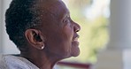 Smile, remember and senior woman thinking on a porch with nostalgia, idea or memory in at a nursing home. Happy, face and elderly African female enjoy fresh air at a retirement facility with peace