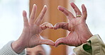 Heart, hands and senior couple with love, care and show trust for support, gratitude or icon at home together. Closeup of man, woman and emoji of peace, hope and loyalty of kindness, respect and sign