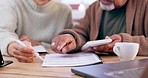 Old couple with bills, calculator and laptop for home budget, mortgage and digital bank payment. Financial documents, senior man and woman at table planning taxes, retirement or audit in apartment.