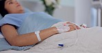 Hospital bed, emergency and nervous woman with iv drip in hand for liquid, hydration or treatment. Healthcare, medicine and female patient with fluid, supplement and health, monitoring or recovery 