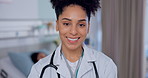 Doctor, face and woman in healthcare, smile with confidence at hospital with pride and help, kindness and trust. Medical professional, health and happy at clinic, expert in portrait with stethoscope