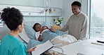 Nurse, mother and son in a hospital for healthcare together during recovery with medical records. Medicine, family and children with people in a pediatrician clinic for rehabilitation or treatment