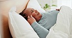 Senior woman, sad and wakeup in bed with grief, mental health and remember regret in house. Elderly African lady, anxiety and depression in bedroom with bad memory, ideas and worry in nursing home