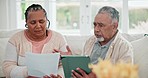 Senior couple, tax documents and tablet with stress, frustrated face and financial mistake on sofa. Elderly woman, old man and digital touchscreen for audit, budget and conflict for fail with fintech