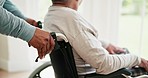 Hands closeup, wheelchair and senior man with helping, push and caregiver in home with support for recovery. People, care and senior person with disability for conversation by window in nursing home