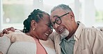 Forehead, touch and senior couple in home on sofa, care or bonding together. Smile, hug and elderly man and woman in living room for support, romantic conversation or love in interracial relationship