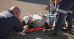 Hands, emergency oxygen and a paramedic group with a patient or victim on the street for accident treatment. Healthcare, medical or first aid with a professional emt team working to rescue a person