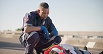 Paramedic man, street and patient on stretcher with talk, motivation or medical attention with thumbs up. First responder, healthcare expert and accident on road for care, support and chat for safety