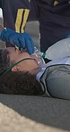 Ventilation, hand of paramedic and woman breathing in street for health emergency, ems or rescue. Oxygen mask, medical worker at road and help patient in accident, injury and first aid resuscitator