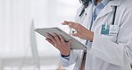 Woman, hands and doctor with tablet in communication, online networking or research at hospital. Closeup of female person, nurse or medical professional working on technology for Telehealth at clinic