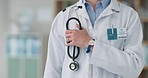 Hands, stethoscope and zoom on doctor at hospital for help, trust or examination. Cardiology, tool and closeup of nurse person with medical tool for lungs, heart or checkup at a clinic for treatment