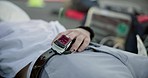 Closeup, ambulance and oximeter for patient after accident for healthcare and pulse monitor. Zoom, support and a medical tool on the finger of a person in a clinic for blood pressure, sick or service