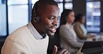 Telemarketing, customer support and man consultant in the office doing online crm consultation. Contact us, headset and professional African male technical service agent working in modern workplace.