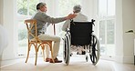 Empathy, love and senior man with sick woman in wheelchair coughing in homecare facility rear view. Back, support and old guy help wife with a disability in a house with cancer, tuberculosis or covid