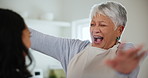 Mom, daughter and reunion with hug, excited and welcome in kitchen of family home or happiness. Wow, mother and woman with surprise visit with love embrace and smile for holiday, vacation or weekend