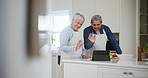 Kitchen, greeting and senior couple with a tablet, video call and communication with connection, apron and cooking. Home, happy elderly man and old woman with technology, online instructions and wave