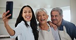 Selfie, happy family and together with smile in kitchen to remember, quality time and bond. People, parent and woman with happiness in relationship with memory for social media, mobile app or web