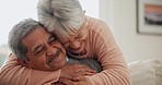 Old couple, relax and hug with love and support in marriage, retirement and happiness together at home. Comfort, care and bonding with life partner, people in living room with trust and commitment 