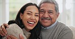 Love, hugging and woman with senior father on sofa for bonding together in the living room. Smile, happy and portrait of young female person embracing her elderly dad in retirement at modern home.