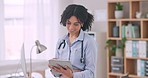 Tablet, happy and woman doctor doing research in hospital for medical diagnosis or treatment. Smile, digital technology and female healthcare worker scroll on the internet for information in a clinic